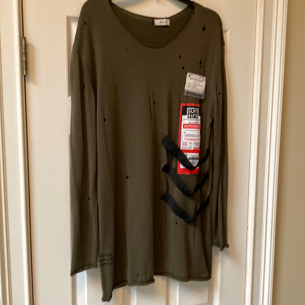 Show off long tunic top with distressed look. Olive green and very soft